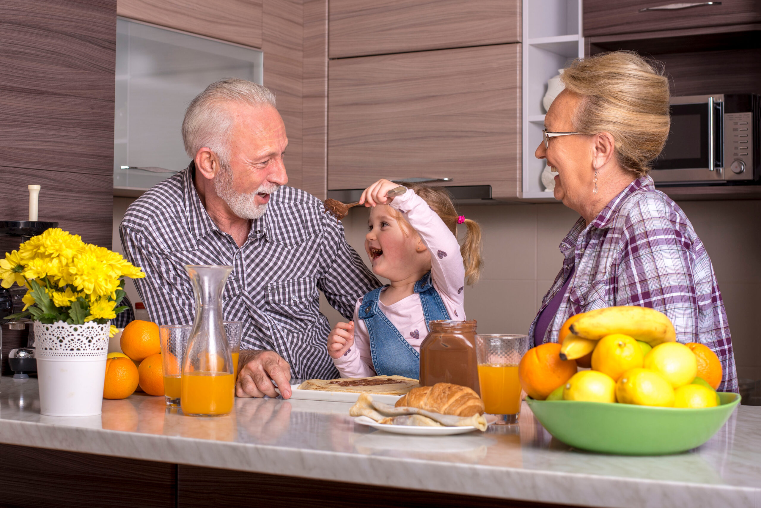 grandparents with grandchild