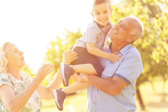 grandparents with grandchild