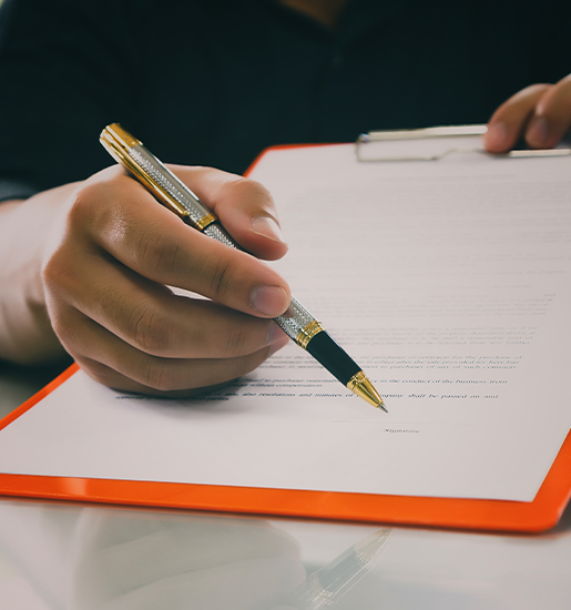 Close up of business man signing contract making a deal business contract details