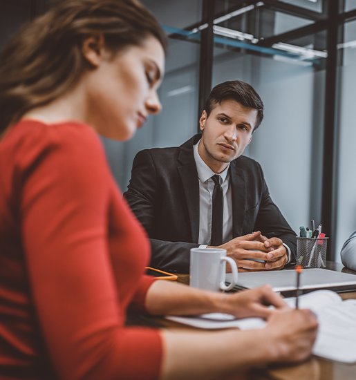 Man and woman writing a divorce request