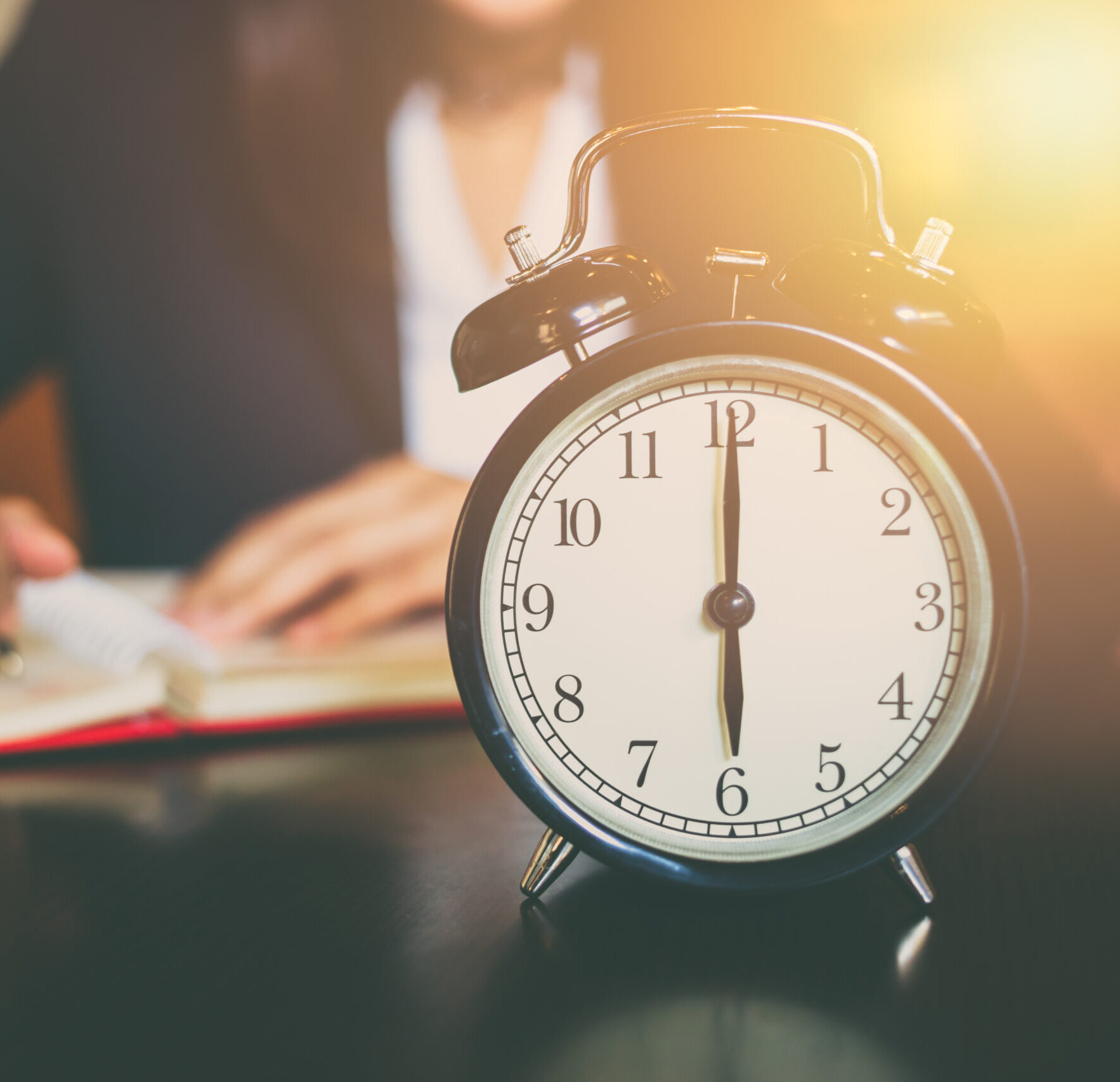 business working time concept. morning 6 o'clock with work people on background